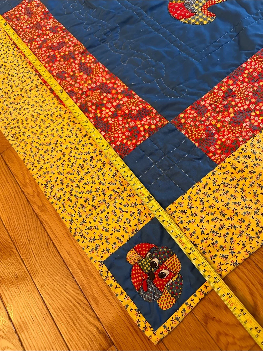 1960s handmade calico dog baby, toddler quilt primary colors, dog bone stitching